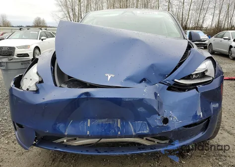 2023 Tesla Model Y from USA, damaged, VIN 7SAYGDEE3PF814331